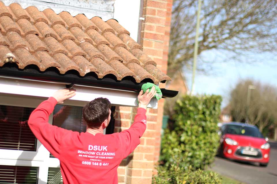 Hand cleaning guttering, fascia's and soffit's
